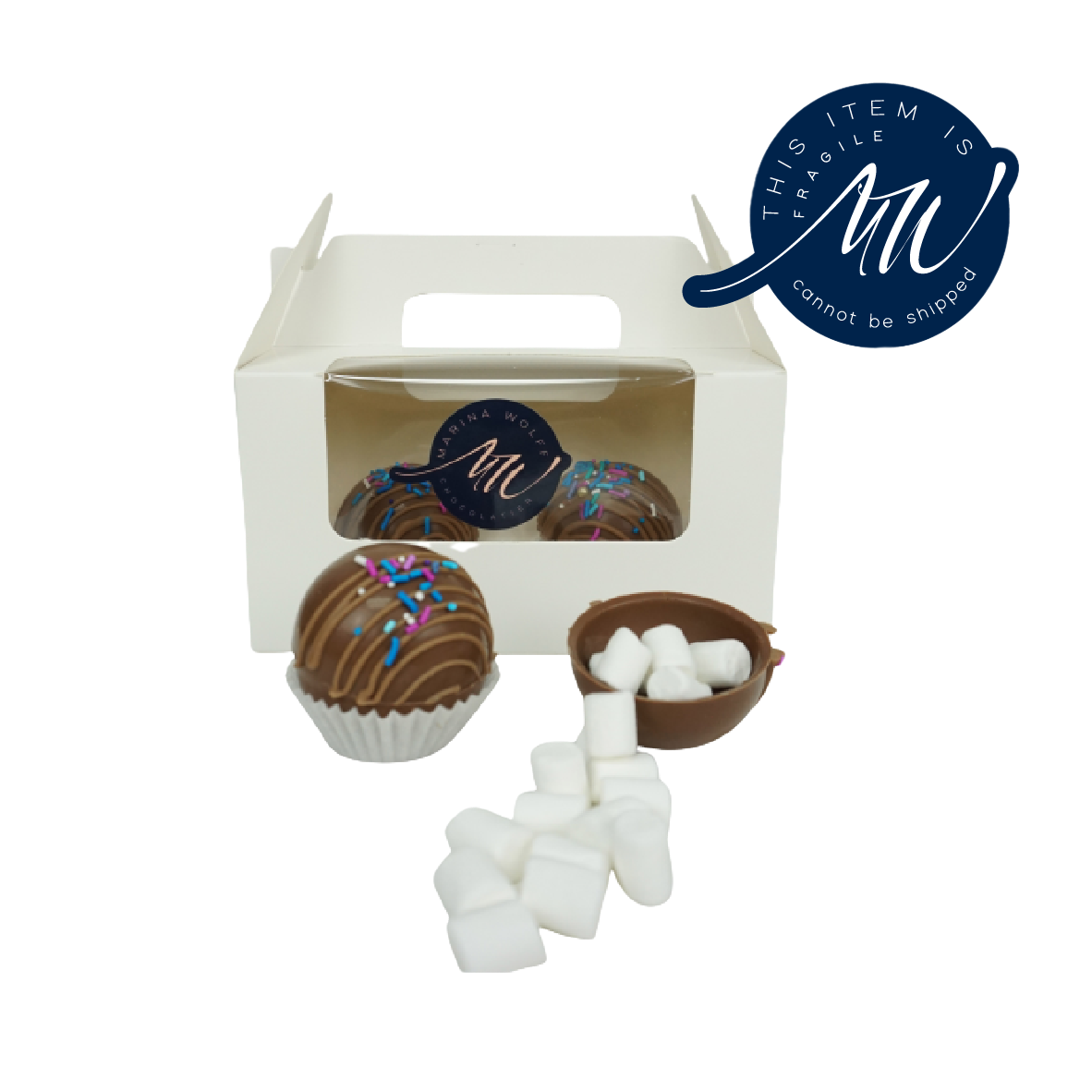 White box with chocolate and 1 chocolate sphere and 1 half-sphere with mini-marshmallows in it with a label that says 'this item is fragile cannot be shipped'
